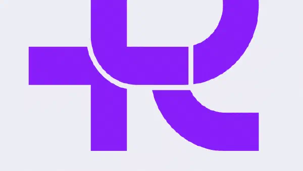 New RLadies+ submark logo, a purple R with a cross/pluss sign in the middle.